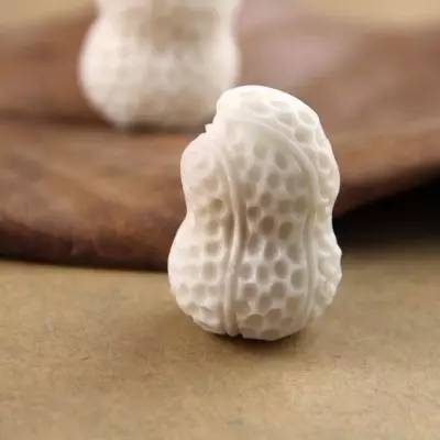 象牙果工艺品好吗,雕刻艺术果雕
