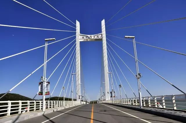 大连七座桥,大连金湾桥历史