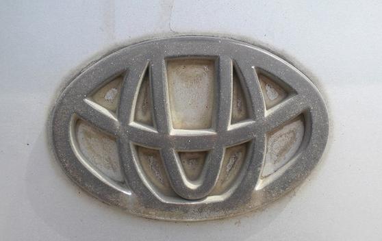 吉利车标仿制凯迪拉克,吉利美日牌是哪一款车