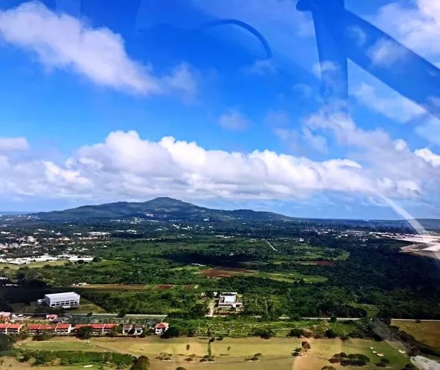 上午在广州捂白过严冬,下午在塞班岛放肆晒黑