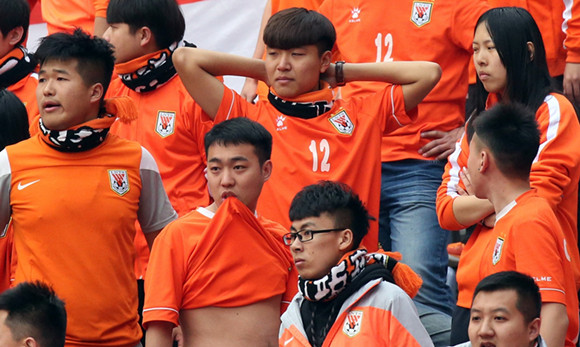 别让下课成为中超联赛的流行曲