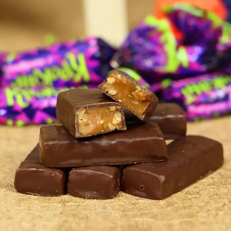 紫皮糖*庄大**家：全国一年卖5亿，他家占3亿，这个糖果进口商牛了！