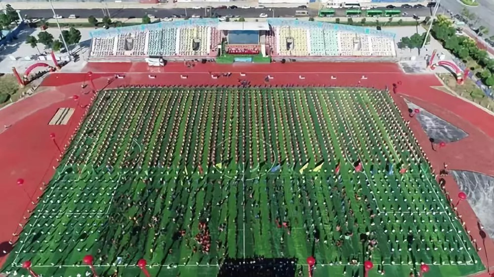 体彩环中原2018自行车公开赛南阳镇平站暨“世界健身气功日”健身气功比赛激情开赛