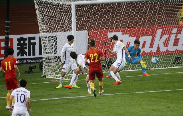 国足将迎12强赛首战图片,金英权对中国足球的评价