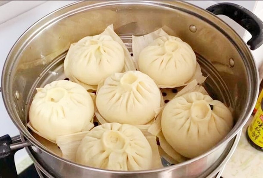 蒸包子怎么开锅蒸不塌皮不回缩,为什么蒸包子总有一两个包子回缩