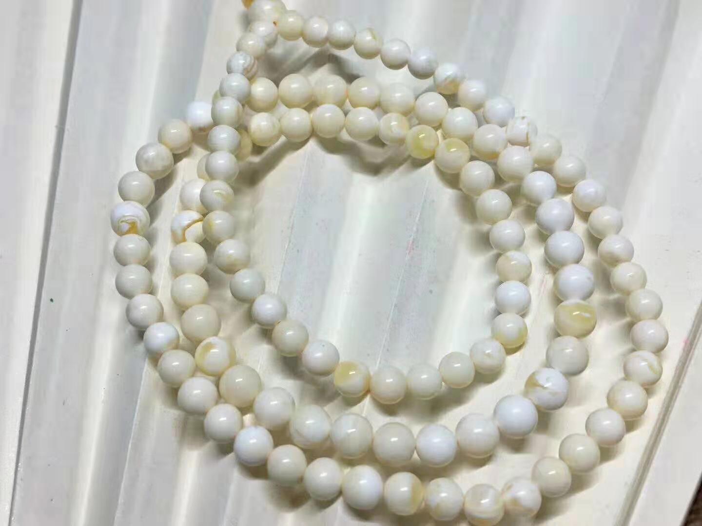 365紫光灯光下蜜蜡真假对照图,辨别蜜蜡真假的小窍门