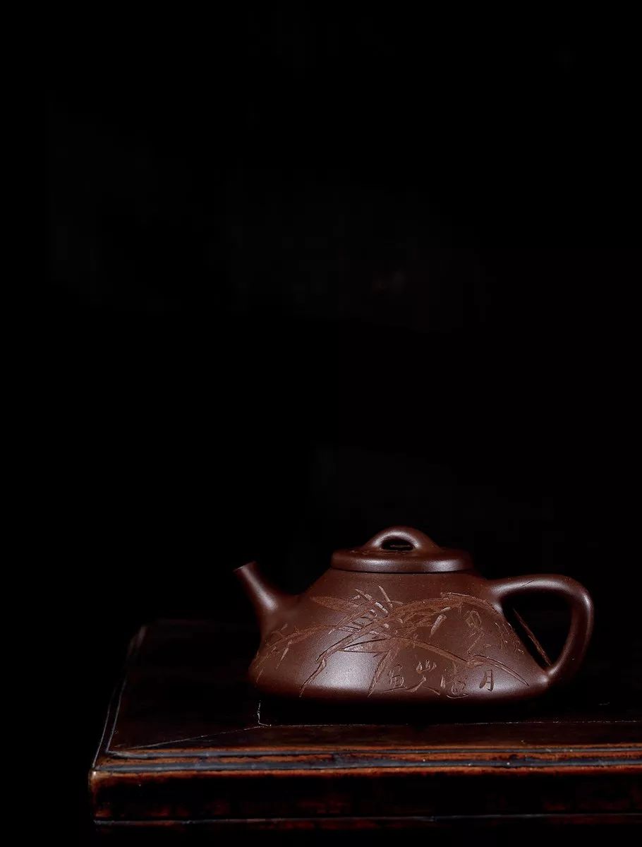 陈鸣远松鼠柿子壶,陈鸣远真品紫砂笋形茶壶拍卖价