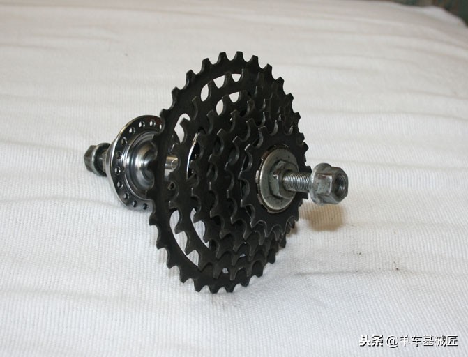 自行车花鼓上的塔基是怎样组装的,怎么判断飞轮与花鼓塔基契合