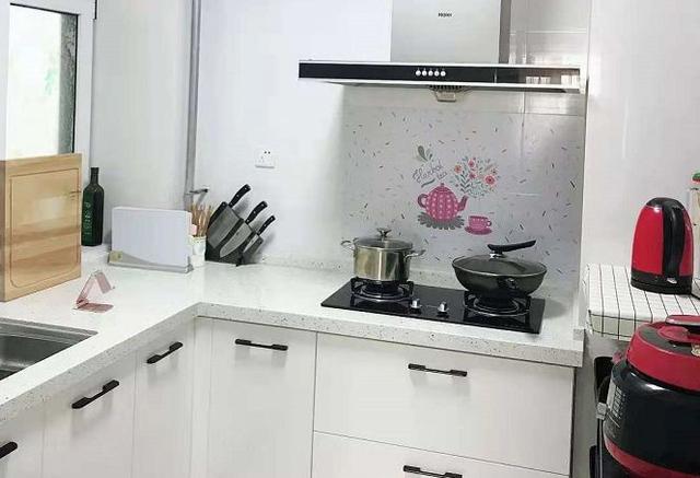 橱柜台面人造石好还是不锈钢好,橱柜用人造大理石台面还是石英石