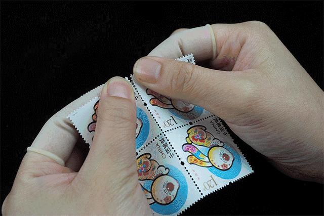 怎么撕邮票最简单,揭邮票的方法