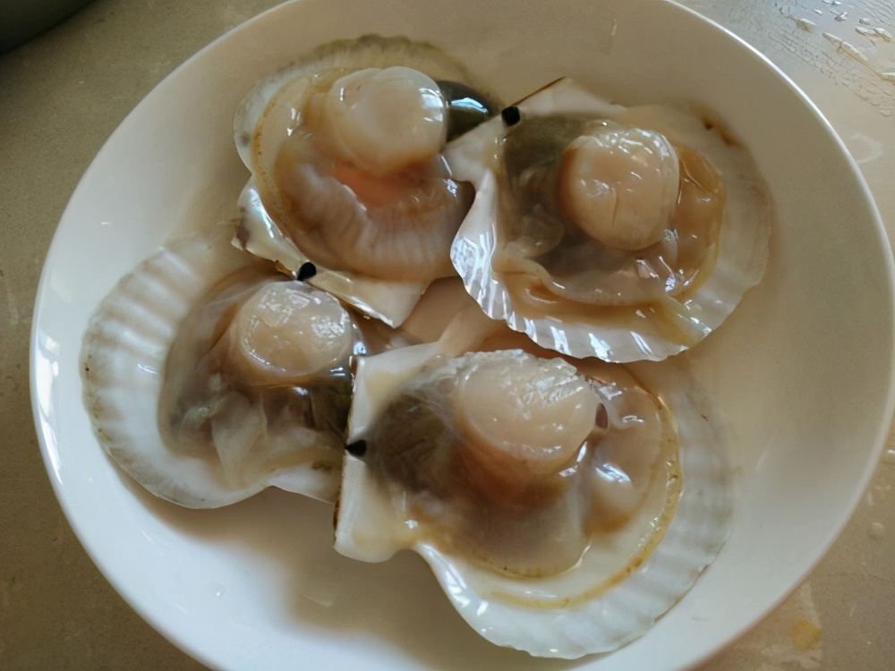蒜蓉粉丝蒸扇贝做法扇贝怎么处理,已经蒸熟的扇贝能不能做蒜蓉扇贝