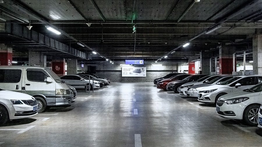 买车每年返1万返五年,买车位15万租车位500