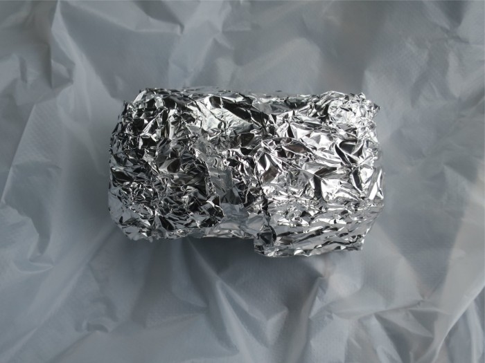 日本札幌的这家烤土豆店很特别，老板是条狗