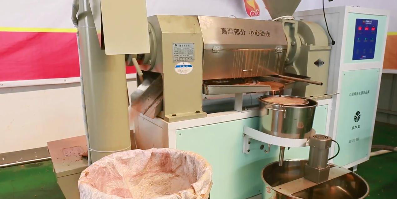 牛人自动榨油机,牛人发明小型榨油机