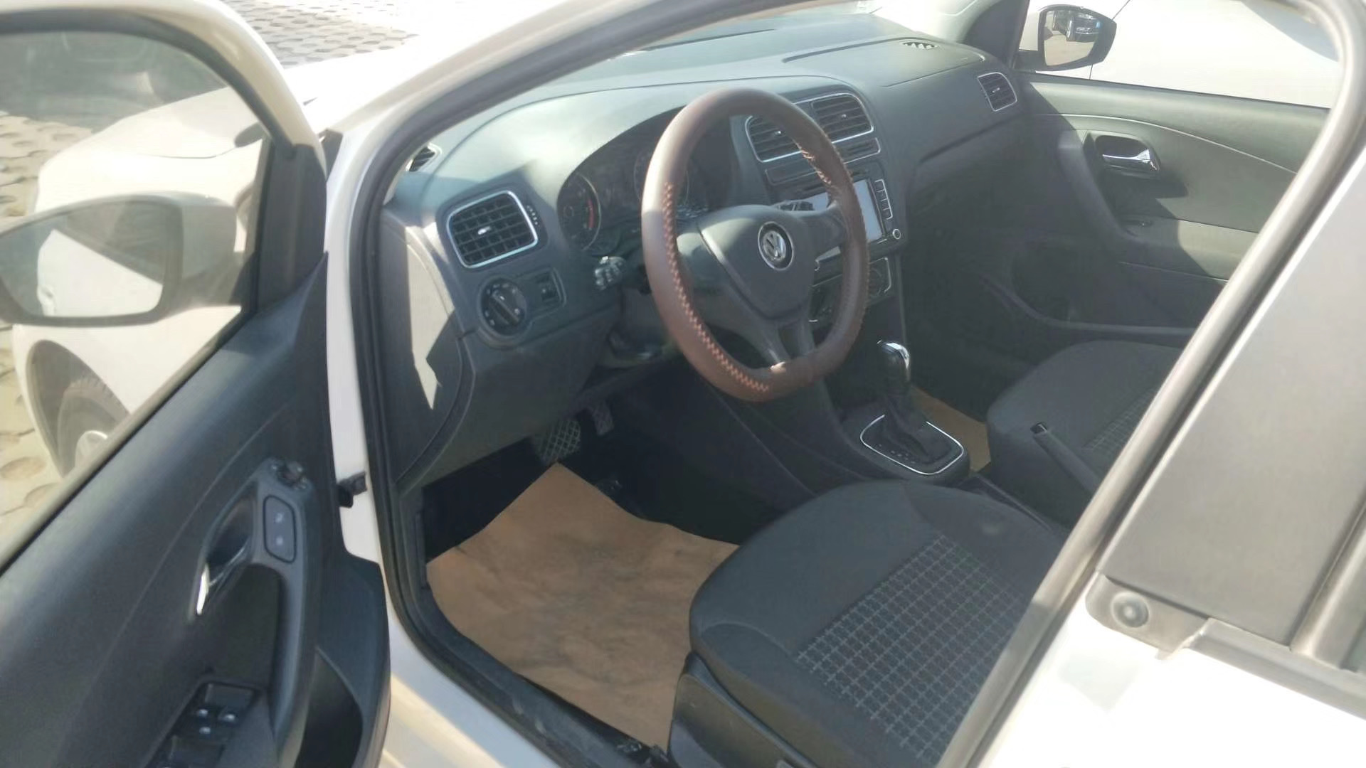 15年大众polo手动1.4二手车值得吗,15年大众polo1.6自动挡多少钱