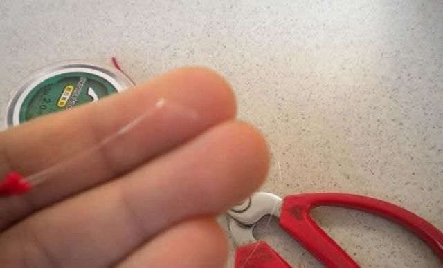 怎么把主线的断线绑在鱼竿上,主线断线打结方法