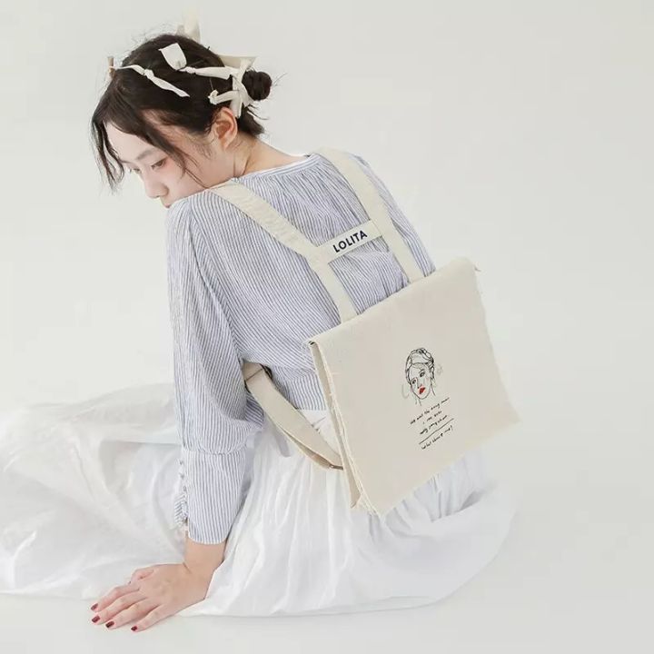 黑色抽绳双肩包出街百搭,双肩包出街推荐大学生小巧