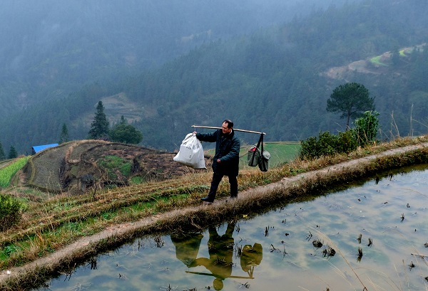中国退役军人丨张林昌:34年风雨无阻,一位山乡邮递员的19次“二万五千里长征”