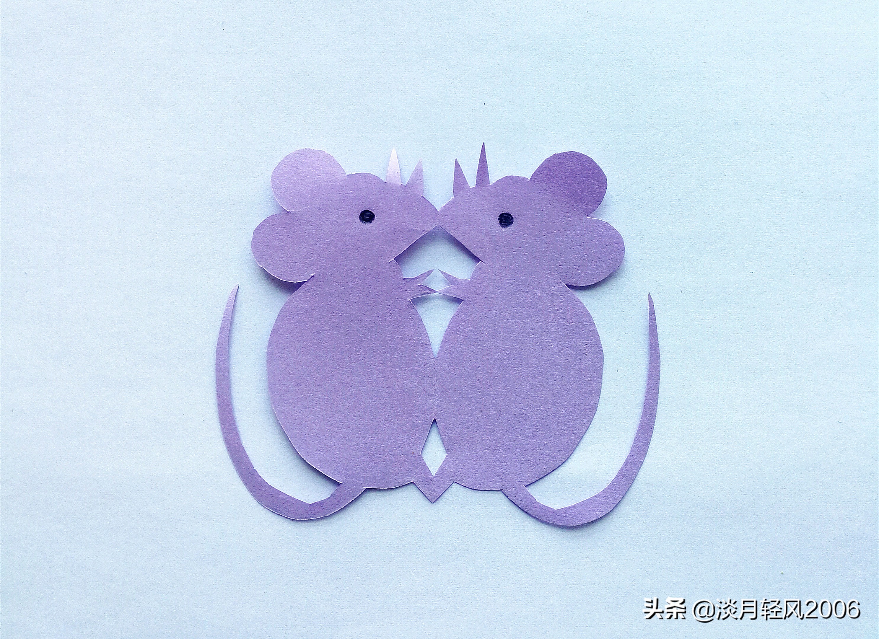 剪纸小老鼠怎么剪,手工剪纸剪出一对老鼠