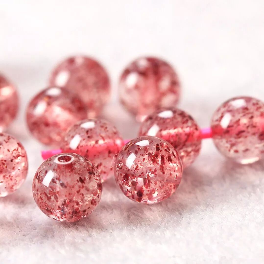 粉水晶和草莓晶可以一起戴不,金草莓晶和粉水晶哪个功效强