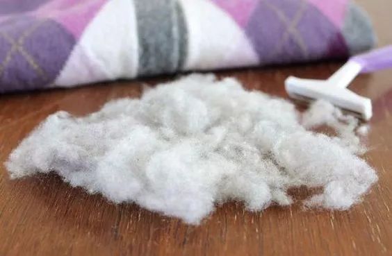 羊毛衣能用含酶洗衣粉吗,羊毛衣可以用洗衣粉吗