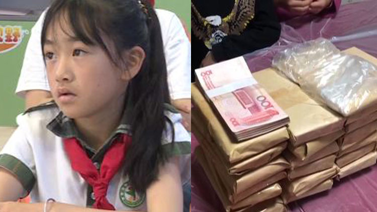 遛狗捡到51万巨款以为是冥币,男孩遛狗捡到100万