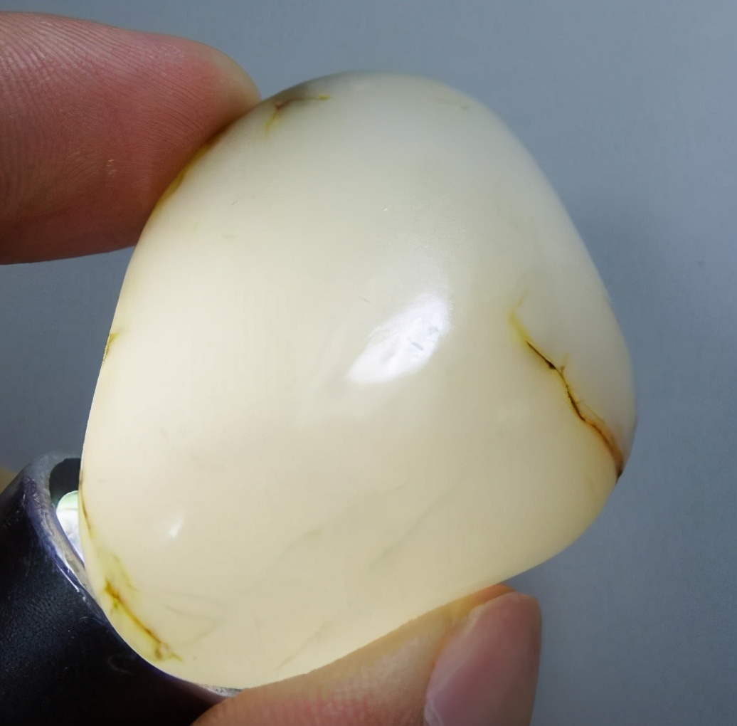 和田玉的纹路与裂纹怎么区分真假,和田玉籽料表面的裂纹是怎么形成