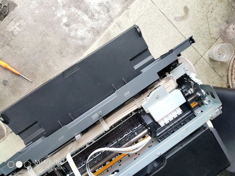 爱普生l1300进纸一点就显示卡纸,爱普生l1300打印歪斜卡纸