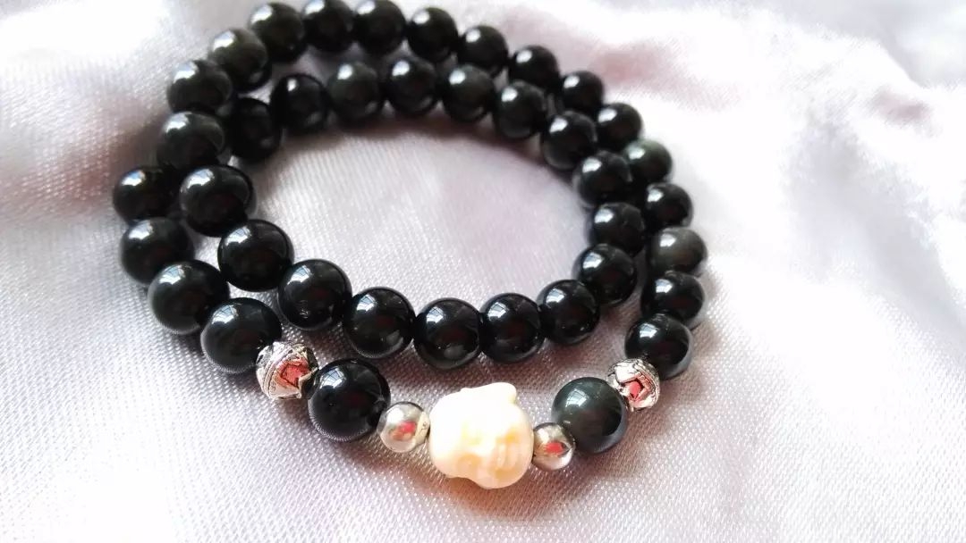 黑曜石是不透光的吗,黑曜石是非均质体吗