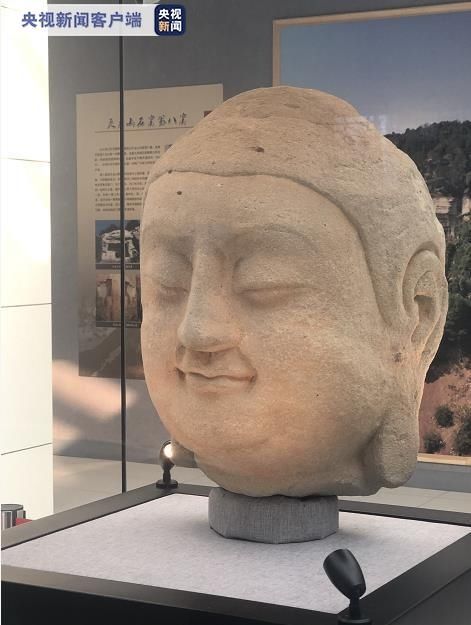 天龙山佛首上春晚：三十二好相之面相