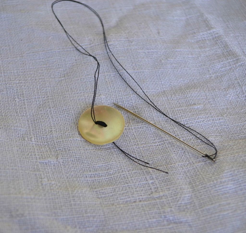 衣服扣纽扣办法,衣服纽扣扣错了怎么取出来