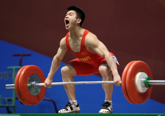占旭刚2008举重冠军,占旭刚2000年举重央视解说