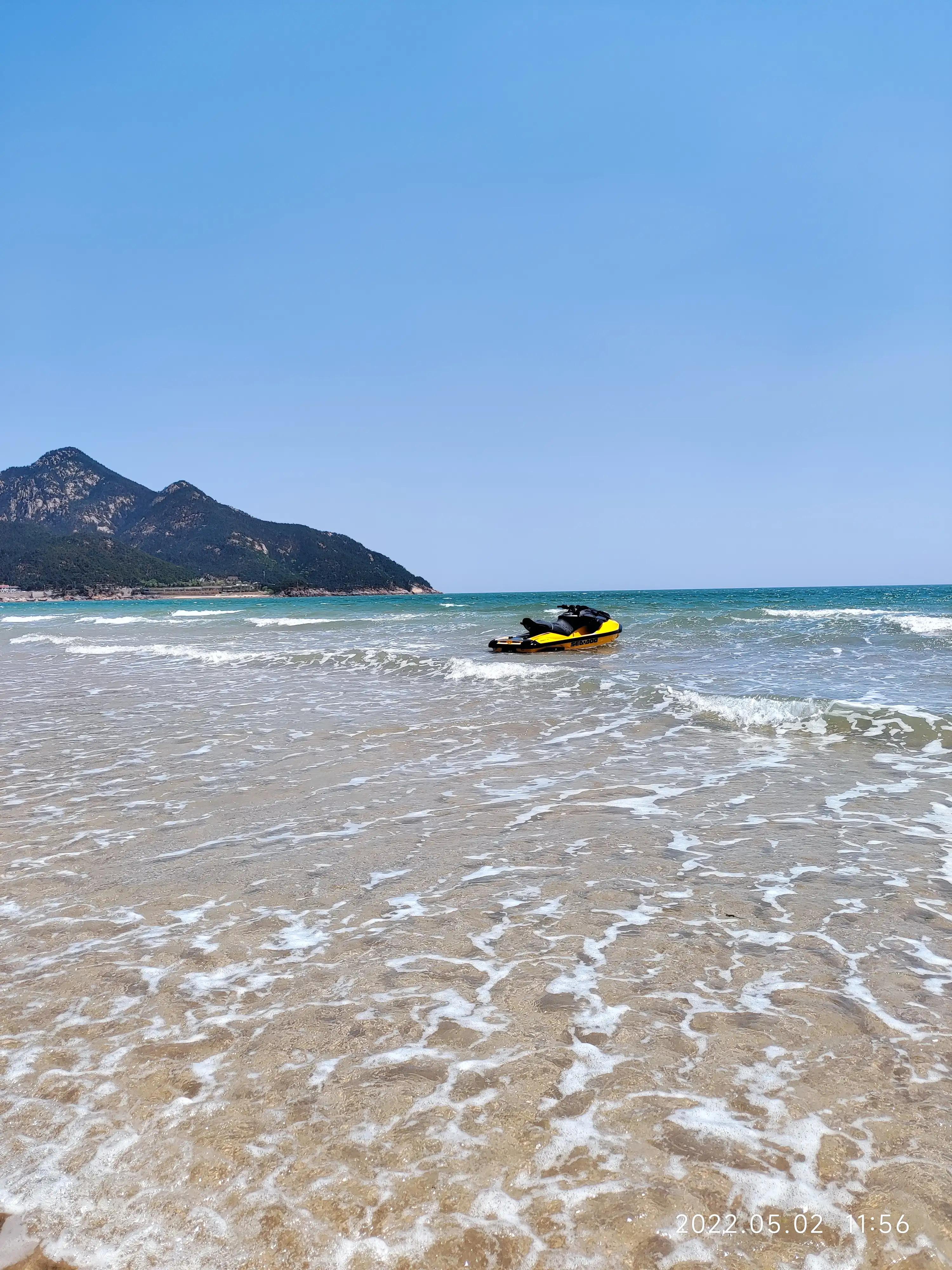 闹市里的风景亦令人赏心悦目,青岛秋千海边沙滩