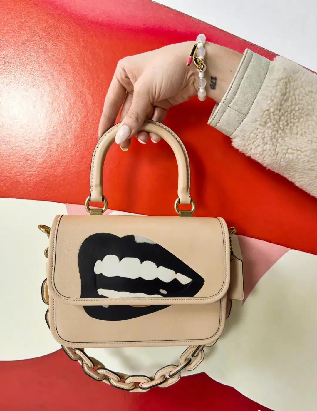 coach蔻驰klare系列风琴包黑色,蔻驰COACHBEAT系列斜挎包