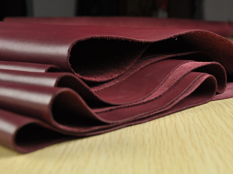 苯胺皮属于真皮里什么档次,苯胺皮和其他皮革的区别