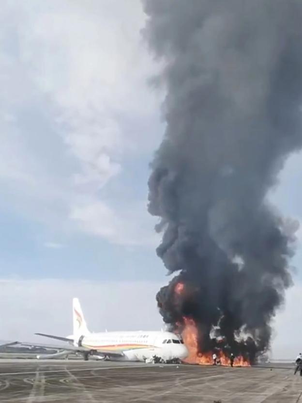 重庆机场飞机起火的是飞往哪里的,重庆机场客机起火原因