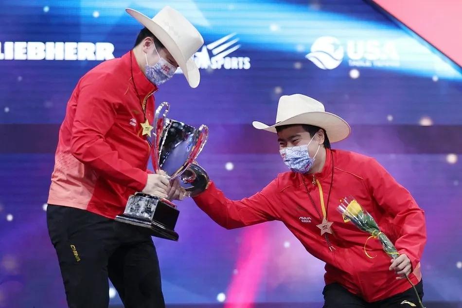 樊振东遭奖杯盖砸头,樊振东遭奖杯盖砸头和马龙对比