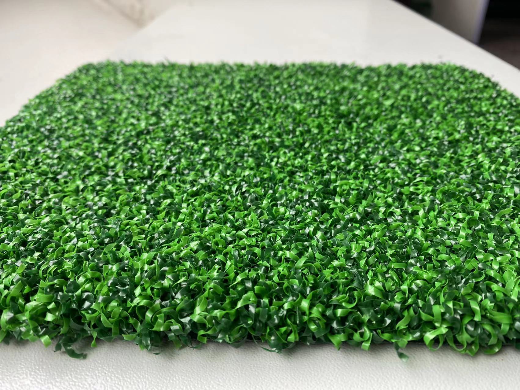 哈尔滨门球场人造草坪生产厂家,门球场人造草坪内填石英砂标准