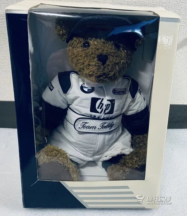 摩托车后面为什么放个玩具熊,摩托车上为什么挂毛绒玩具