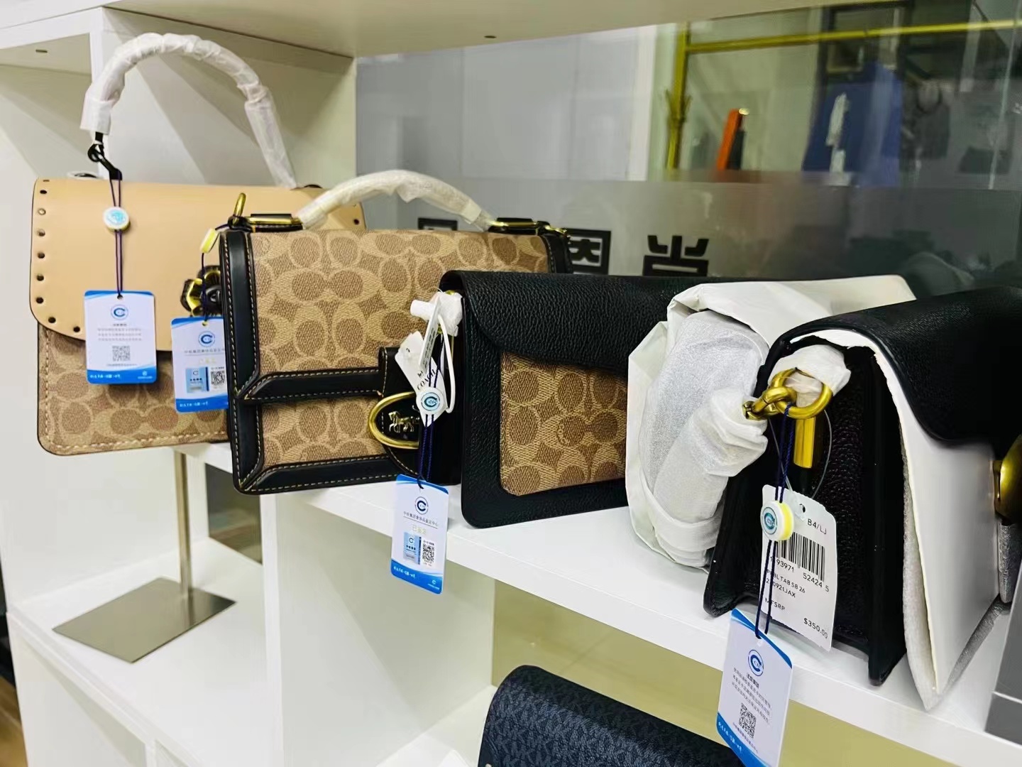 coach经典水桶包大号好还是小号好,coach经典水桶包