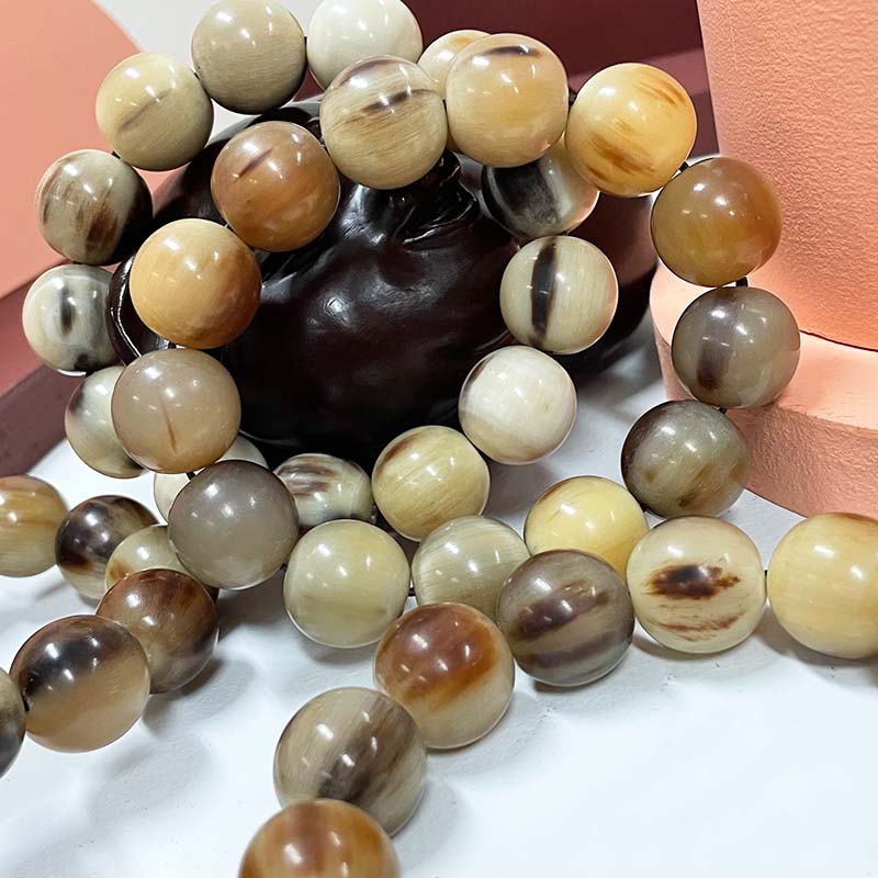 如何盘玩玉石手串,如何盘玩牛角手链