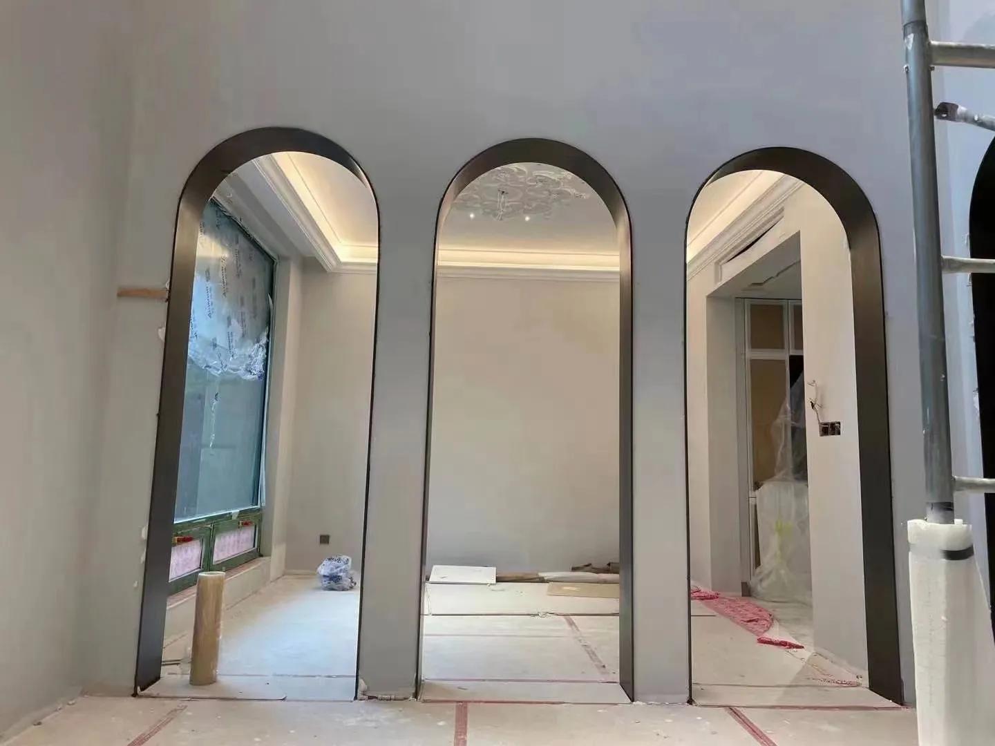 弧形背景墙弧形门套,客厅不锈钢窄边门套造型效果图