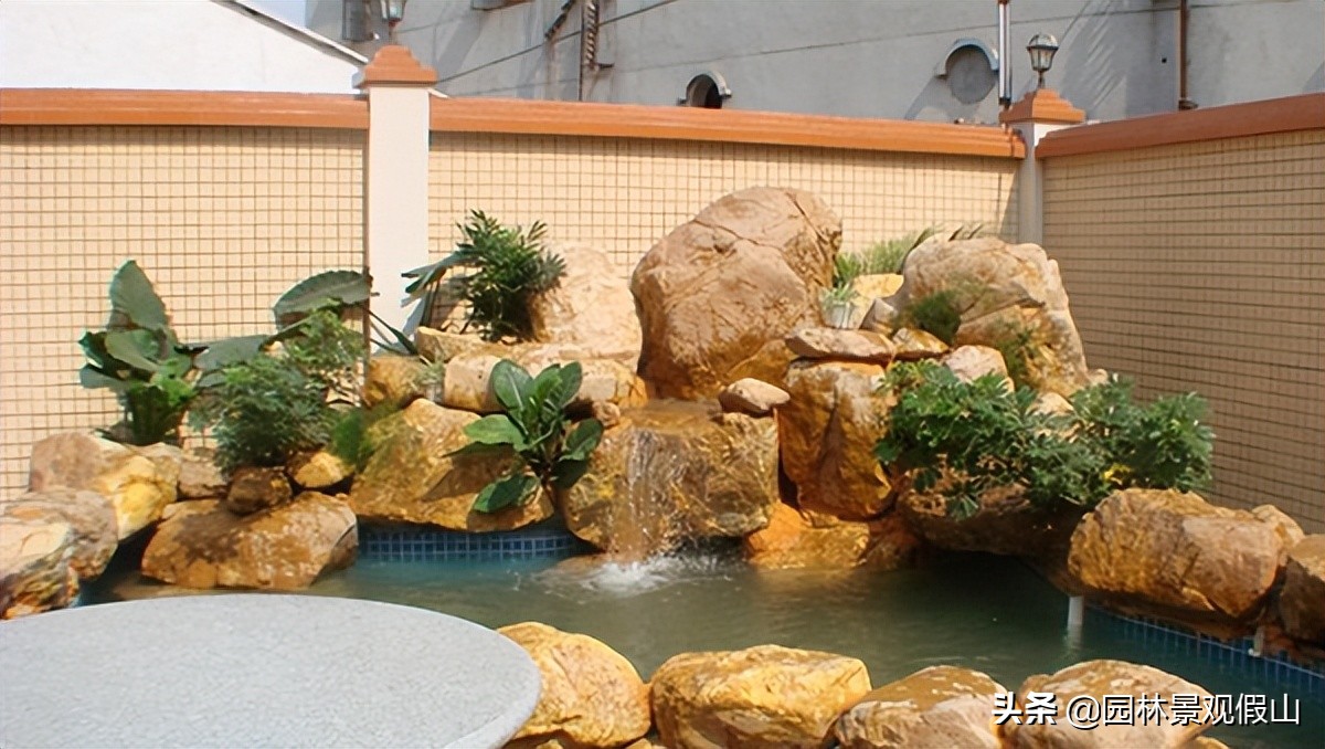 别墅假山鱼池景观,别墅假山设计与营造