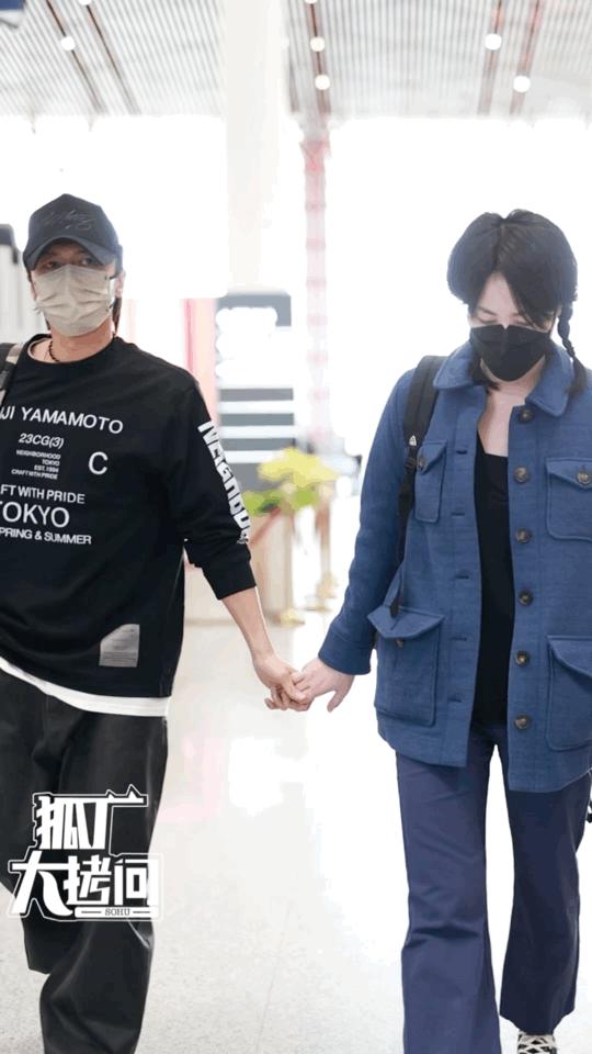 节目采访王菲谢霆锋世纪牵手,王菲谢霆锋机场大方牵手狂秀恩爱