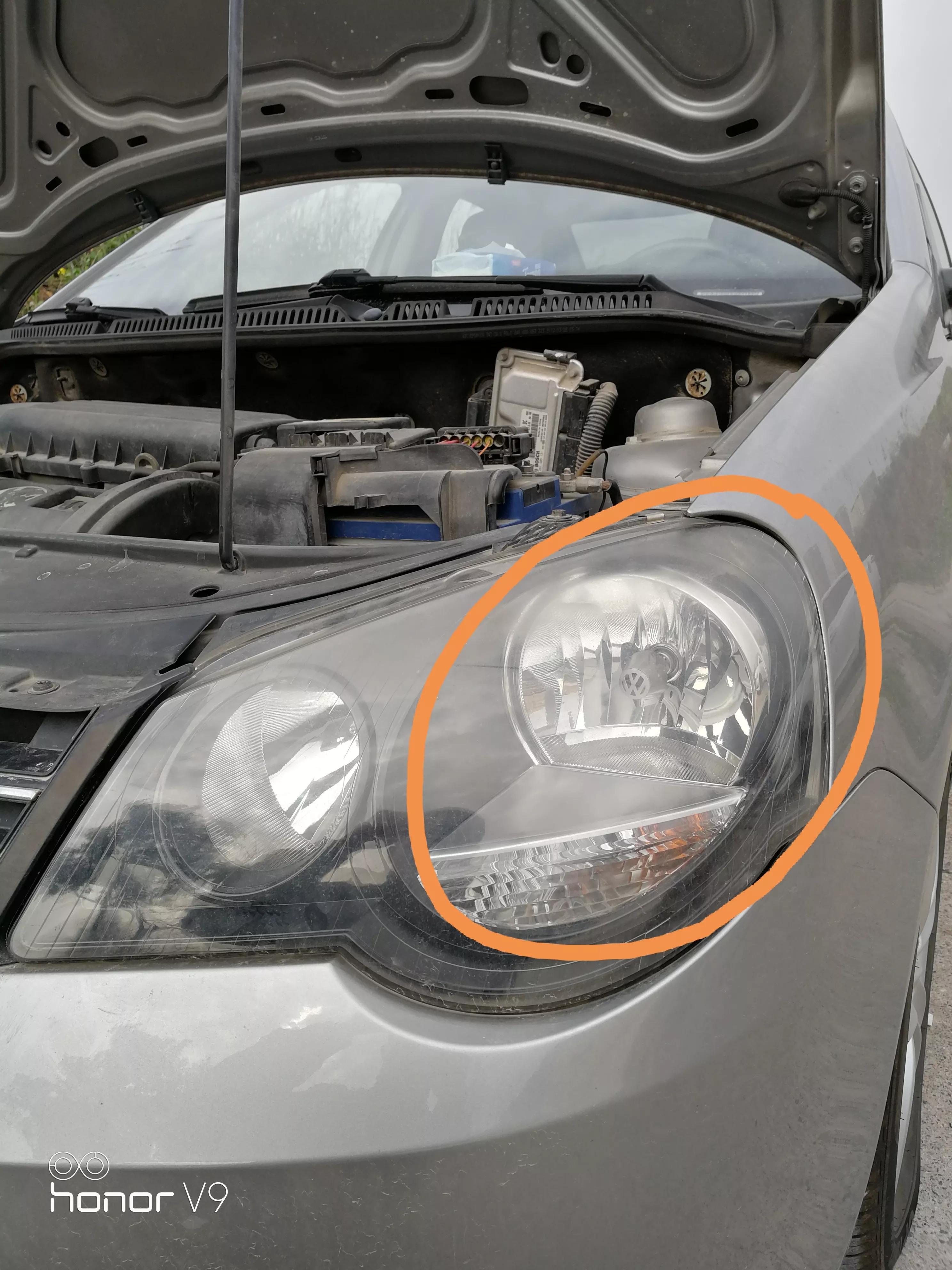 09大众polo近光灯怎么调高低,polo2011劲取改灯