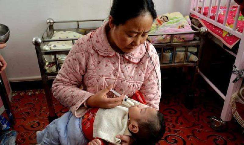 收养118个爱心妈妈为什么判刑,收养118个弃婴的妈妈被判刑