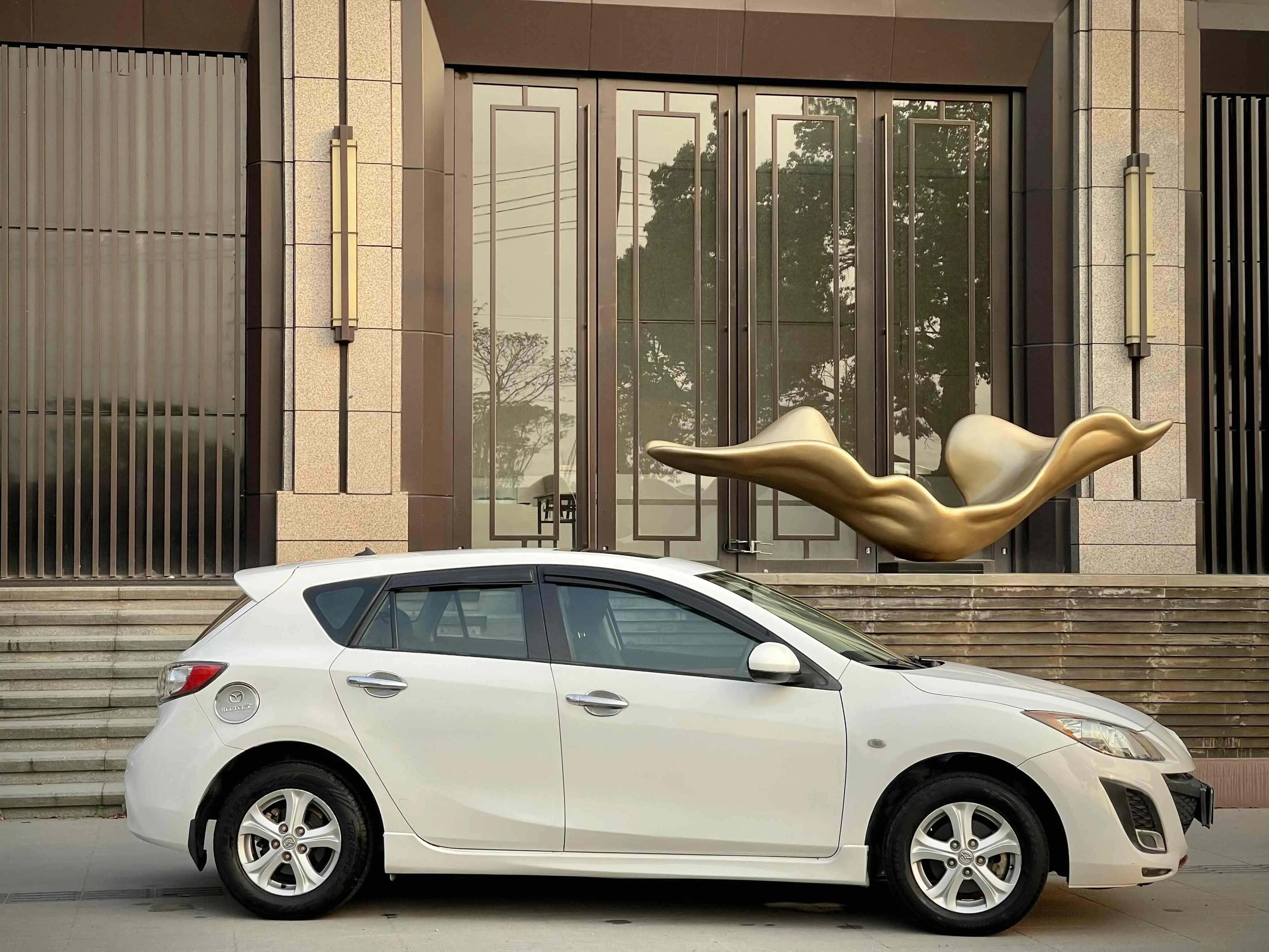 马自达3星骋11款图片,马自达3星骋两厢2012款1.6自动