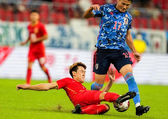 国足1:3惨败回放分析,国足0:1不敌日本图片