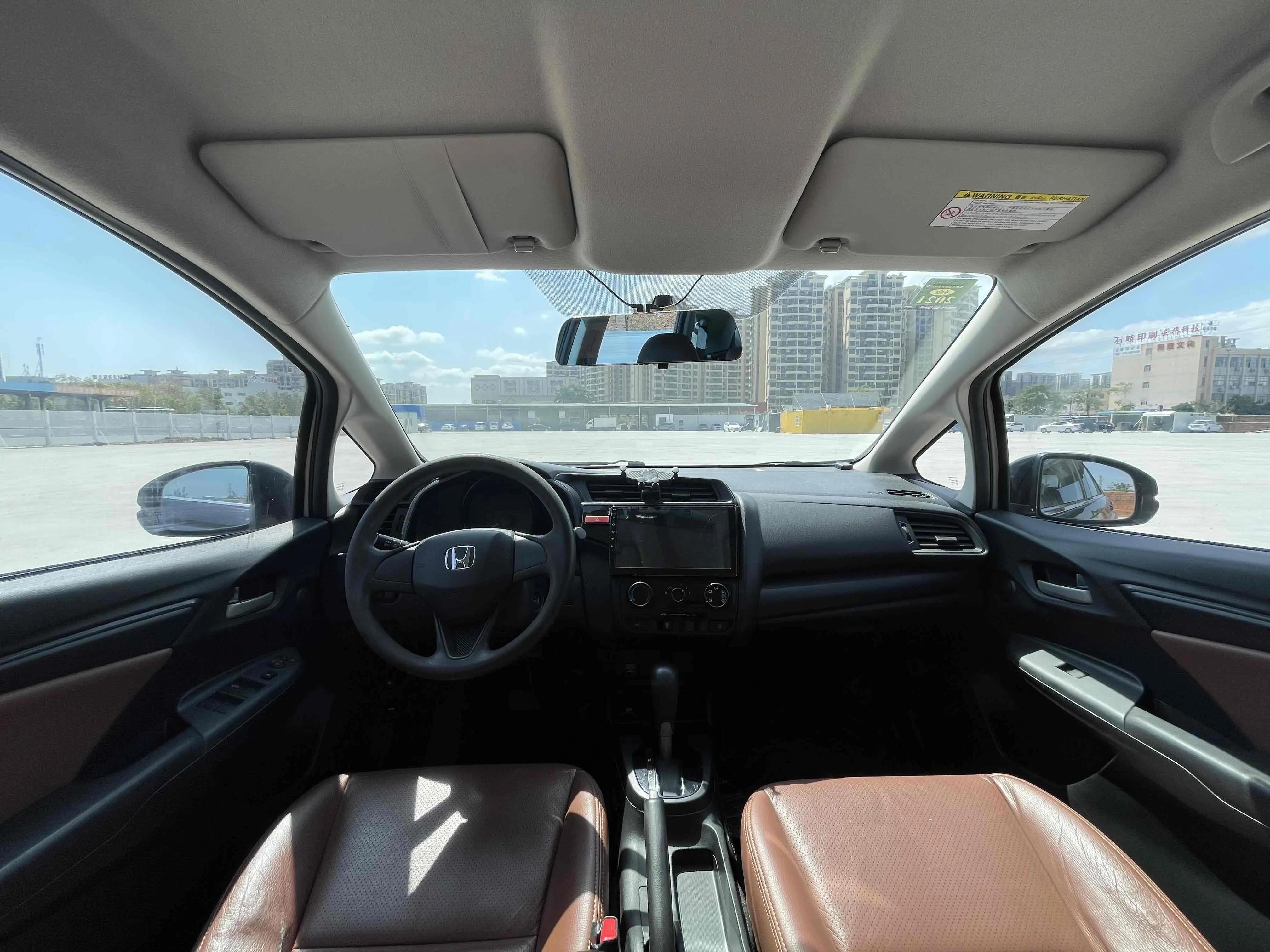 飞度2014款1.5cvtexli领先版价格,本田飞度09款1.3l图片