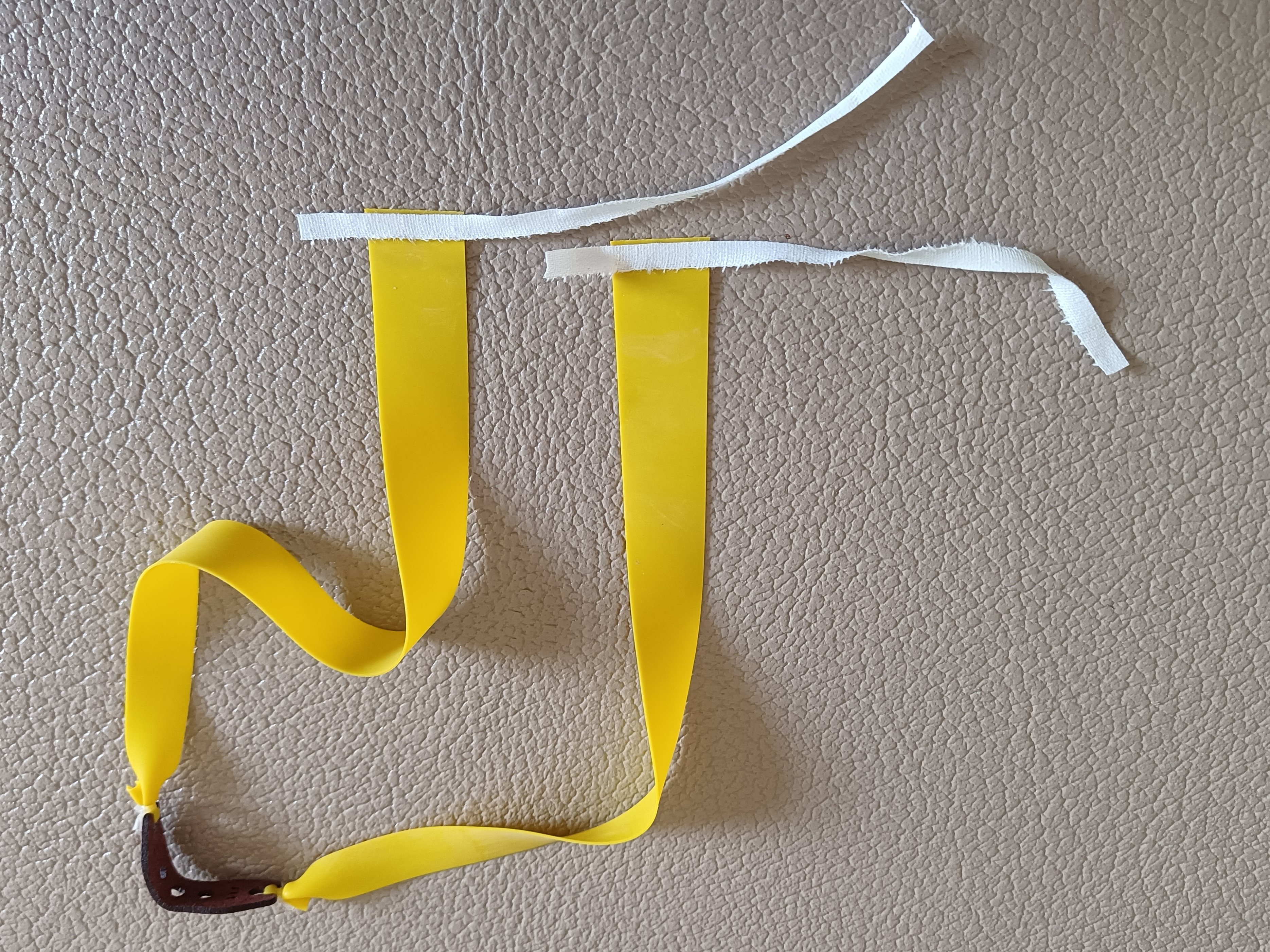 弹弓绑皮筋方头好还是圆头好,圆头快压弹弓伤皮筋怎么处理